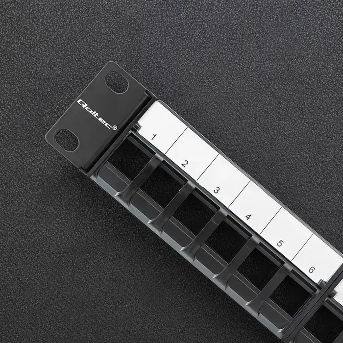 Qoltec Solid steel patch panel for 19'' rack | 24 ports | 1U | UTP | Black Photo